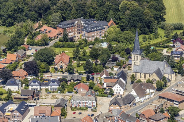 Aerial view, St. Dionysius Catholic Church, Kirchstraße, St. Franziskus-Haus, Pröbstingstraße, Nordwalde, Münsterland, North Rhine-Westphalia, Germany, retirement home, retirement home for religious, retirement home, retirement home, place of worship, care and nursing, DE, Europe, religious community, place of worship, church, parish, denomination, aerial view, aerial photography, aerial photography, care facility, religion, religious institution, retirement home, retirement residence, retirement home, senior citizens' centre, overview, bird's eye view, living and life, birds-eyes view, overview