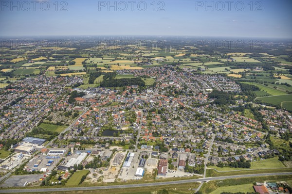 Aerial view, view of the town, Gildestraße industrial estate, Schwesternbusch woodland, St Dionysius Catholic Church, St Francis House, Cardinal von Galen Comprehensive School, Nordwalde, Münsterland, North Rhine-Westphalia, Germany. Franziskus-Haus, Kardinal von Galen Comprehensive School, Nordwalde, Münsterland, North Rhine-Westphalia, Germany, retirement home, retirement home for religious, retirement home, retirement home, place of worship, care and nursing, education, educational institution, DE, Europe, distant view, comprehensive school, commercial enterprises, commercial area, commercial area, commercial park, commercial site, commercial use, religious community, place of worship, industrial area, industrial site, church, parish, denomination, educational institute, aerial view, aerial photography, aerial photography, care facility, religion, school, retirement home, retirement residence, retirement home, retirement centre, townscape, urban area, overview, bird's-eye view, bird...