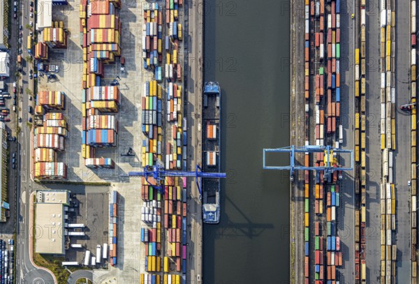 Aerial view, harbour area, harbour facilities, Contargo Neuss GmbH, container loading, container ship, Obererft, Neuss, city limits Düsseldorf, Rhineland, North Rhine-Westphalia, Germany, DE, Europe, birds-eyes view, aerial view, aerial photography, aerial photography, overview, bird's eye view, port operating company, Neuss-Düsseldorfer Häfen GmbH & Co. KG, Spedition Ansorge GmbH & Co. KG, Tanquid GmbH & Co. KG Tanklager Neuss I, Neuss customs office, Rhine, car transport, car loading, cargo ships, BLG AutoTransport GmbH & Co. KG, Neuss harbour, Neuss port, port of Neuss, Rhine port, inland port, port facility, inland shipping