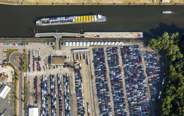 Aerial photo, harbour area, harbour facilities, Obererft, Neuss, city limits Düsseldorf, Rhineland, North Rhine-Westphalia, Germany, DE, Europe, birds-eyes view, aerial photo, aerial photography, aerial photography, overview, bird's eye view, harbour operating company, Neuss-Düsseldorfer Häfen GmbH & Co. KG, Contargo Neuss GmbH, Spedition Ansorge GmbH & Co. KG, Tanquid GmbH & Co. KG Tanklager Neuss I, Neuss customs office, Rhine, car transport, car loading, cargo ships, Neuss port, port of Neuss, port of Neuss, Rhine port, inland port, port facility, inland shipping