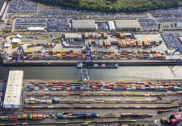 Aerial view, harbour area, harbour facilities, Contargo Neuss GmbH, container loading, container ship, Obererft, Neuss, city limits Düsseldorf, Rhineland, North Rhine-Westphalia, Germany, DE, Europe, birds-eyes view, aerial view, aerial photography, aerial photography, overview, bird's eye view, port operating company, Neuss-Düsseldorfer Häfen GmbH & Co. KG, Spedition Ansorge GmbH & Co. KG, Tanquid GmbH & Co. KG Tanklager Neuss I, Neuss customs office, Rhine, car transport, car loading, cargo ships, BLG AutoTransport GmbH & Co. KG, Neuss harbour, Neuss port, port of Neuss, Rhine port, inland port, port facility, inland shipping