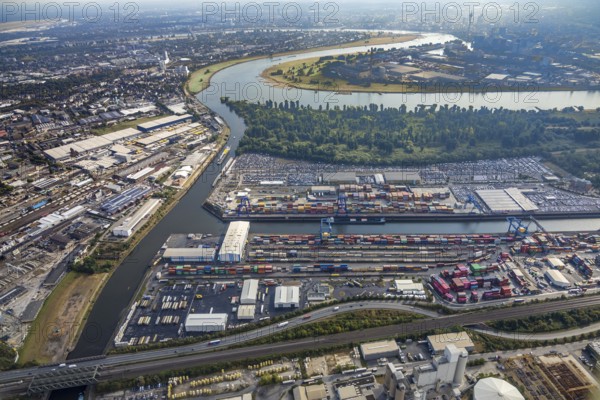 Aerial photo, harbour area, harbour facilities, Obererft, Neuss, city limits Düsseldorf, Rhineland, North Rhine-Westphalia, Germany, DE, Europe, birds-eyes view, aerial photo, aerial photography, aerial photography, overview, bird's eye view, harbour operating company, Neuss-Düsseldorfer Häfen GmbH & Co. KG, Contargo Neuss GmbH, Spedition Ansorge GmbH & Co. KG, Tanquid GmbH & Co. KG Tanklager Neuss I, Neuss customs office, Rhine, car transport, car loading, cargo ships, Neuss port, port of Neuss, port of Neuss, Rhine port, inland port, port facility, inland shipping