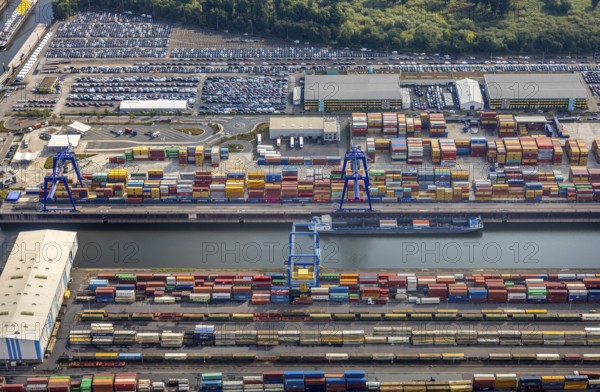 Aerial view, harbour area, harbour facilities, Contargo Neuss GmbH, container loading, container ship, Obererft, Neuss, city limits Düsseldorf, Rhineland, North Rhine-Westphalia, Germany, DE, Europe, birds-eyes view, aerial view, aerial photography, aerial photography, overview, bird's eye view, port operating company, Neuss-Düsseldorfer Häfen GmbH & Co. KG, Spedition Ansorge GmbH & Co. KG, Tanquid GmbH & Co. KG Tanklager Neuss I, Neuss customs office, Rhine, car transport, car loading, cargo ships, BLG AutoTransport GmbH & Co. KG, Neuss harbour, Neuss port, port of Neuss, Rhine port, inland port, port facility, inland shipping