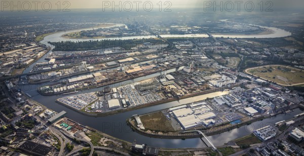 Aerial photo, harbour area, harbour facilities, Obererft, Neuss, city limits Düsseldorf, Rhineland, North Rhine-Westphalia, Germany, DE, Europe, birds-eyes view, aerial photo, aerial photography, aerial photography, overview, bird's eye view, harbour operating company, Neuss-Düsseldorfer Häfen GmbH & Co. KG, Contargo Neuss GmbH, Spedition Ansorge GmbH & Co. KG, Tanquid GmbH & Co. KG Tanklager Neuss I, Neuss customs office, Rhine, car transport, car loading, cargo ships, Neuss port, port of Neuss, port of Neuss, Rhine port, inland port, port facility, inland shipping