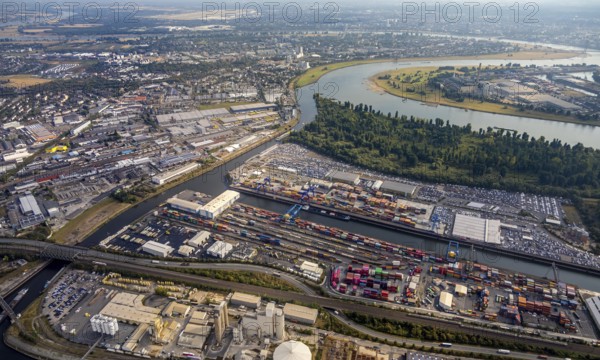 Aerial photo, harbour area, harbour facilities, Obererft, Neuss, city limits Düsseldorf, Rhineland, North Rhine-Westphalia, Germany, DE, Europe, birds-eyes view, aerial photo, aerial photography, aerial photography, overview, bird's eye view, harbour operating company, Neuss-Düsseldorfer Häfen GmbH & Co. KG, Contargo Neuss GmbH, Spedition Ansorge GmbH & Co. KG, Tanquid GmbH & Co. KG Tanklager Neuss I, Neuss customs office, Rhine, car transport, car loading, cargo ships, Neuss port, port of Neuss, port of Neuss, Rhine port, inland port, port facility, inland shipping