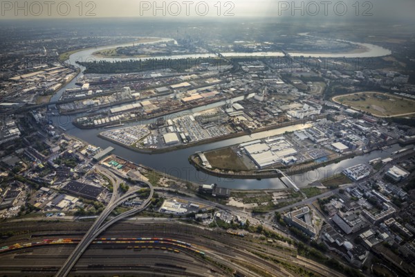 Aerial photo, harbour area, harbour facilities, Obererft, Neuss, city limits Düsseldorf, Rhineland, North Rhine-Westphalia, Germany, DE, Europe, birds-eyes view, aerial photo, aerial photography, aerial photography, overview, bird's eye view, harbour operating company, Neuss-Düsseldorfer Häfen GmbH & Co. KG, Contargo Neuss GmbH, Spedition Ansorge GmbH & Co. KG, Tanquid GmbH & Co. KG Tanklager Neuss I, Neuss customs office, Rhine, car transport, car loading, cargo ships, Neuss port, port of Neuss, port of Neuss, Rhine port, inland port, port facility, inland shipping