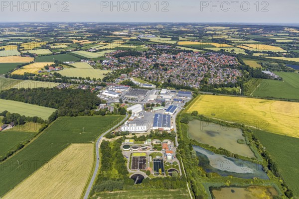 Aerial view, aerial view Appelhülsen, industrial area Industriestraße, Lippeverband Dortmund sewage treatment plant, Nottuln, Münsterland, North Rhine-Westphalia, Germany, DE, Europe, commercial enterprises, commercial area, commercial park, commercial location, commercial use, property tax, real estate, industrial area, industrial location, sewage treatment plant, agricultural fields, aerial view, aerial photography, aerial photography, local view, parcels, townscape, urban area, overview, bird's-eye view, forest area, meadows and fields, residential area, housing and living, residential area, residential buildings, housing quality, housing estate, birds-eyes view, overview