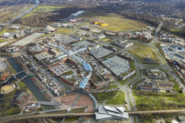 Aerial view, Centro shopping centre, new building POCO Einrichtungsmarkt, yellow-red building, Oberhausen, Ruhr area, North Rhine-Westphalia, Germany, DE, shopping centre, shopping mall, shopping mile, shopping markets, shopping square, shopping centre, Europe, canal on the promenade, aerial view, aerial photography, aerial photography, furniture shop, local supply centre, Neue Mitte, shopping, overview, bird's eye view, birds-eyes view, overview