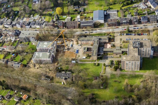 Aerial view, construction site new building Louise-Schroeder-Heim, Osterfeld, Oberhausen, Ruhr area, North Rhine-Westphalia, Germany, construction work, construction area, construction site, building plots, construction crane, construction measure, construction site, DE, Europe, capacity requirements, aerial view, aerial photography, aerial photography, medical facility, medical assistance, new building, nursing care, nursing home, Siepenstraße, overview, bird's eye view, growth, birds-eyes view, overview, medical care