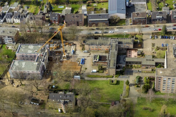 Aerial view, construction site new building Louise-Schroeder-Heim, Osterfeld, Oberhausen, Ruhr area, North Rhine-Westphalia, Germany, construction work, construction area, construction site, building plots, construction crane, construction measure, construction site, DE, Europe, capacity requirements, aerial view, aerial photography, aerial photography, medical facility, medical assistance, new building, nursing care, nursing home, Siepenstraße, overview, bird's eye view, growth, birds-eyes view, overview, medical care