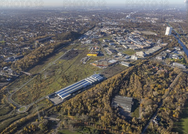 Aerial view, Neue Mitte, CentrO site, gasometer renovation measures, Poco Einrichtungsmarkt, Landgard Cash & Carry, Newag Maschinenbau im Wald, Borbeck, Oberhausen, Ruhr area, North Rhine-Westphalia, Germany, flower wholesaler, Brammenring, DE, shopping centre, shopping mall, shopping mile, shopping markets, shopping square, shopping centre, Europe, gastronomy, commercial enterprises, commercial area, commercial area, commercial park, commercial location, commercial use, Hornbach Baumarkt, hotel, hotel complex Super 8, hotel facilities, hotel business, industrial area, industrial building, industrial location, aerial view, aerial photography, aerial photography, furniture shop, local supply centre, shopping, shopping centre, overview, wrapping, bird's-eye view, overview, wrapped gasometer, white tarpaulins