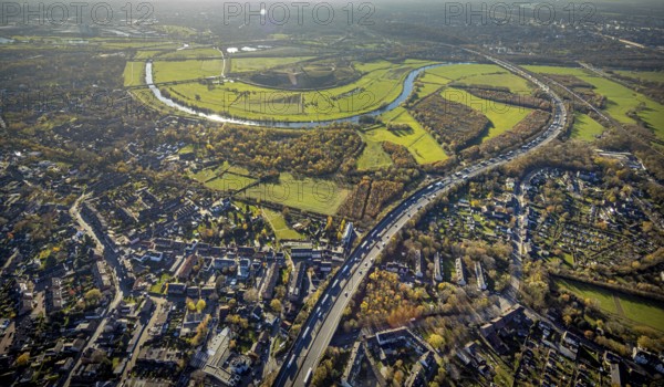 Aerial view, Styrumer Ruhrbogen, Ruhrwiesen, landfill Kolkerhofweg, city triangle Duisburg-Oberhausen-Mülheim, wind turbine, river Ruhr, Mülheim an der Ruhr, Ruhr area, North Rhine-Westphalia, Germany, bridge over the Ruhr, DE, Duisburg, railway bridge, Europe, distant view, flood, aerial view, aerial photography, aerial photography, Ruhr floodplain, Ruhr valley cycle path, Ruhr river bank, Speldorfer Straße, overview, bird's-eye view, wind energy, wind turbine, wind power, wind turbine, wind turbines, birds-eyes view, overview, flooding