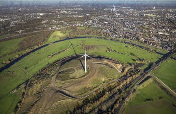 Aerial view, Styrumer Ruhrbogen, Ruhrwiesen, landfill Kolkerhofweg, city triangle Duisburg-Oberhausen-Mülheim, wind turbine, river Ruhr, Mülheim an der Ruhr, Ruhr area, North Rhine-Westphalia, Germany, bridge over the Ruhr, DE, railway bridge, Europe, distant view, flood, aerial view, aerial photography, aerial photography, Ruhr floodplain, Ruhr valley cycle path, Ruhr river bank, Speldorfer Straße, overview, bird's-eye view, wind energy, wind turbine, wind power, wind energy plant, wind turbines, birds-eyes view, overview, flooding