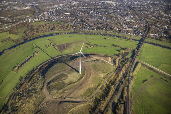 Aerial view, Styrumer Ruhrbogen, Ruhrwiesen, landfill Kolkerhofweg, city triangle Duisburg-Oberhausen-Mülheim, wind turbine, river Ruhr, Mülheim an der Ruhr, Ruhr area, North Rhine-Westphalia, Germany, bridge over the Ruhr, DE, railway bridge, Europe, distant view, flood, aerial view, aerial photography, aerial photography, Ruhr floodplain, Ruhr valley cycle path, Ruhr river bank, Speldorfer Straße, overview, bird's-eye view, wind energy, wind turbine, wind power, wind energy plant, wind turbines, birds-eyes view, overview, flooding