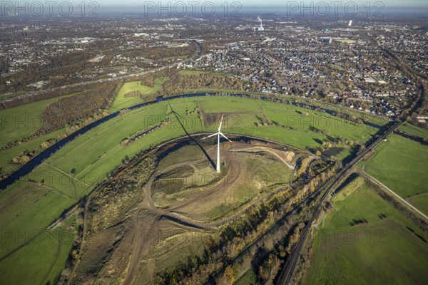 Aerial view, Styrumer Ruhrbogen, Ruhrwiesen, landfill Kolkerhofweg, city triangle Duisburg-Oberhausen-Mülheim, wind turbine, river Ruhr, Mülheim an der Ruhr, Ruhr area, North Rhine-Westphalia, Germany, bridge over the Ruhr, DE, railway bridge, Europe, distant view, flood, aerial view, aerial photography, aerial photography, Ruhr floodplain, Ruhr valley cycle path, Ruhr river bank, Speldorfer Straße, overview, bird's-eye view, wind energy, wind turbine, wind power, wind energy plant, wind turbines, birds-eyes view, overview, flooding