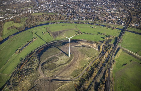 Aerial view, Styrumer Ruhrbogen, Ruhrwiesen, landfill Kolkerhofweg, city triangle Duisburg-Oberhausen-Mülheim, wind turbine, river Ruhr, Mülheim an der Ruhr, Ruhr area, North Rhine-Westphalia, Germany, bridge over the Ruhr, DE, railway bridge, Europe, distant view, flood, aerial view, aerial photography, aerial photography, Ruhr floodplain, Ruhr valley cycle path, Ruhr river bank, Speldorfer Straße, overview, bird's-eye view, wind energy, wind turbine, wind power, wind energy plant, wind turbines, birds-eyes view, overview, flooding