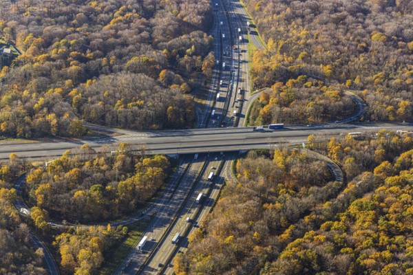 Aerial view, motorway junction Oberhausen, motorway A3, federal road B516, forest area in autumn colours, Schmachtendorf, Oberhausen, Ruhr area, North Rhine-Westphalia, Germany, motorway bridge, motorway junction, bridge, DE, Europe, autumn colours, autumn forest, aerial view, aerial photography, aerial photography, overview, traffic volume, bird's-eye view, forest area, birds-eyes view, overview