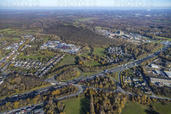 Aerial view, industrial estate Im Venn, Sterkrader Venn, motorway A2 junction Oberhausen-Königshtardt, Königshtardt, Oberhausen, Ruhr area, North Rhine-Westphalia, Germany, motorway A2, motorway junction, DE, Europe, distant view, commercial enterprises, commercial area, commercial area, commercial park, commercial location, commercial use, autumn colours, industrial area, industrial building, industrial location, Kasper Bau, aerial view, aerial photography, aerial photography, overview, Venngraben, bird's-eye view, birds-eyes view, overview