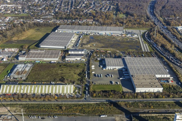 Aerial view, industrial estate Im Lekkerland, Geodis Logistik, Lekkerland, SEGRO Logistics Park, Waldteich, Holten, Oberhausen, Ruhr area, North Rhine-Westphalia, Germany, DE, Europe, commercial enterprises, commercial area, industrial estate, commercial park, commercial location, commercial use, freight transport, industrial area, industrial building, industrial site, logistics, logistics service, logistics service provider, logistics provider, logistics centre, aerial view, aerial photography, aerial photography, freight forwarding, transport, transport service, overview, bird's eye view, birds-eyes view, im Lekkerland, overview