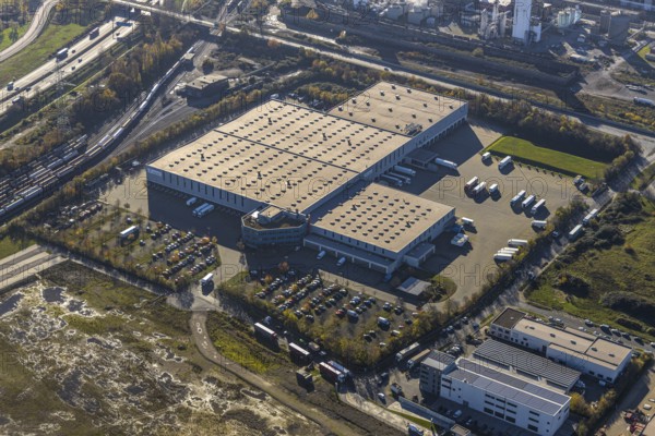 Aerial view, commercial area Im Lekkerland, Lekkerland, Holten, Oberhausen, Ruhr area, North Rhine-Westphalia, Germany, DE, Europe, commercial enterprises, commercial area, commercial park, commercial location, commercial use, freight traffic, industrial area, industrial building, industrial location, logistics, logistics service, logistics service provider, logistics provider, logistics centre, aerial view, aerial photography, aerial photography, aerial photography, freight forwarding, transport, transport service, overview, bird's eye view, birds-eyes view, im Lekkerland, overview