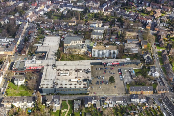 Aerial view, XXXLutz furniture store, Astrid-Lindgren-Schule, Oberhausen, Ruhr area, North Rhine-Westphalia, Germany, education, educational institution, DE, shopping square, shopping centre, Europe, specialist markets, primary school, property tax, high-rise buildings, real estate, educational institute, aerial photography, aerial photography, multi-family houses, apartment buildings, school, shopping, overview, bird's-eye view, residential complex, living and living, residential area, residential buildings, housing estate, birds-eyes view, overview