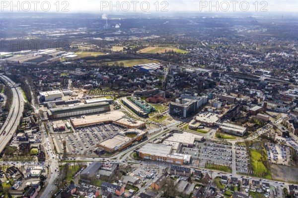 Aerial view, view of Sterkrade, Sterkrader Tor shopping centre, Gute Hoffnung residential complex, Reinholf-Krohn-Park, Technisches Rathaus, car park Technisches Rathaus, construction site new building Steinbrinkstraße Eugen-Zur-Nieden-Ring, Sterkrade, Oberhausen, Ruhr area, North Rhine-Westphalia, Germany, Bahnhofstraße, construction work, construction area, construction site, building plots, construction measure, construction project, construction site, DE, shopping, shopping centre, shopping mall, shopping markets, shopping square, shopping centre, Europe, retail park, retail park, commercial park, commercial location, commercial use, capacity requirement, aerial view, aerial photography, aerial photography, Martha Schneider-Bürger Platz, local supply centre, new building, town hall, shopping, overview, bird's-eye view, overview