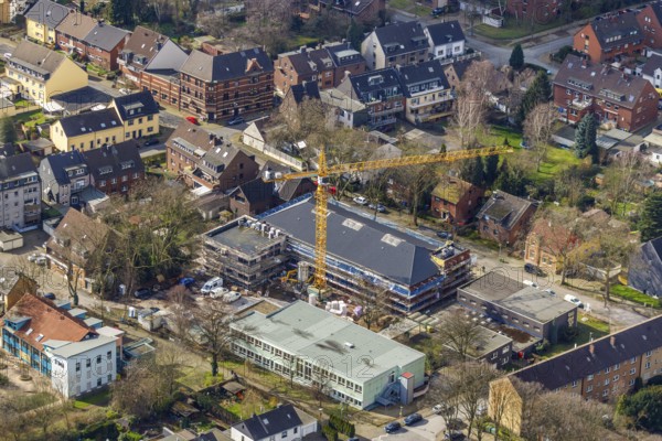 Aerial view, former secondary school Eisenheim, construction area new building Robert-Koch-Schule, Erikastraße, area TTC Osterfeld 2012 e.V., Osterfeld, Oberhausen, Ruhr area, North Rhine-Westphalia, Germany, Am Stemmersgraben, construction work, construction area, construction site, building plots, construction crane, construction measure, construction project, construction site, education, educational institution, DE, development, Europe, primary school, Integratives Familienzentrum treasure chest der Lebenshilfe Oberhausen gGmbH, capacity requirements, teaching institute, aerial view, aerial photography, aerial photography, new building, school, overview, bird's eye view, birds-eyes view, overview