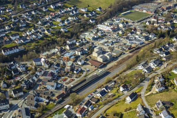 Aerial view, Sundern railway station, railway tracks, new construction integrative housing project Kurze Straße, Sundern, Sauerland, North Rhine-Westphalia, Germany, DE, Europe, aerial view, aerial photography, aerial photography, overview, bird's-eye view, birds-eyes, view, overview, train traffic, railway traffic, traffic connection, travel, holiday, housing construction, integrative, housing, inclusion, barrier-free, inclusion project