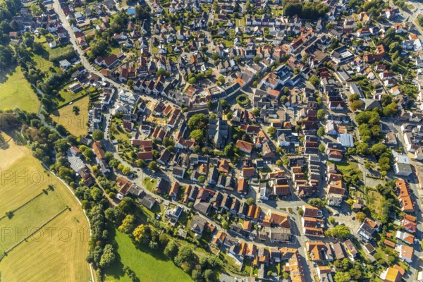 Aerial view, local view, parish church St. Marien, Steinheim, OWL, Ostwestfalen-Lippe, East Westphalia, North Rhine-Westphalia, Germany, place of worship, DE, Europe, religious community, place of worship, property tax, holy place, real estate, church, parish, denomination, aerial view, aerial photography, aerial photography, OWL book, OWL book, religion, religious site, townscape, urban area, overview, bird's-eye view, housing estate, housing and living, residential area, residential buildings, residential quality, residential neighbourhood, housing estate, birds-eyes view, overview