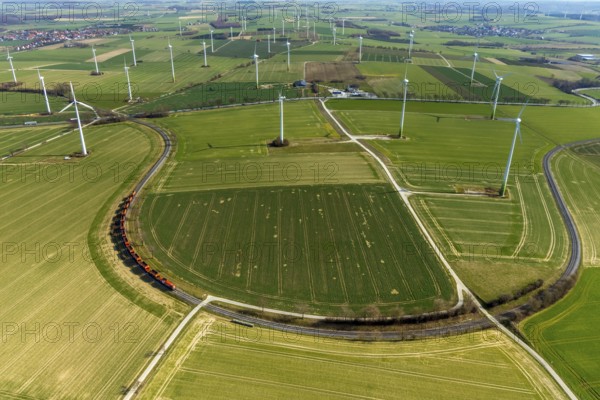 Aerial view, wind turbines on the B55 federal road, train on railway line, Warstein, North Rhine-Westphalia, Germany