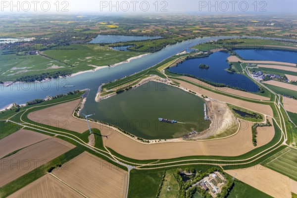 Aerial view, river Rhine, excavation lakes Bislicher Ley, Roosenhofsee, Grindsee, wind turbines, Rees, Lower Rhine, North Rhine-Westphalia, Germany, quarry pond, DE, Europe, distant view, gravel extraction, aerial view, aerial photography, aerial photography, shipping, overview, bird's eye view, meadows and fields, birds-eyes view, overview