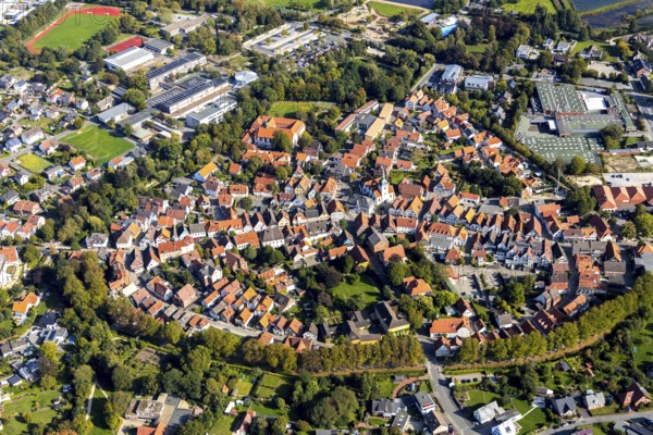 Aerial view, Old Town, Rietberg Town Hall, St. Johannes Baptist Catholic Parish Church, Rietberg, OWL, East Westphalia-Lippe, East Westphalia, North Rhine-Westphalia, Germany, Old People's Home, St. Johannes Baptist Nursing Home, Old People's Home, Old Town Bolzenmarkt, Old Town View, Old Town Ring, Place of Worship, Authority, Care and Nursing, DE, Europe, Half-timbered houses, Religious community, House of God, Property tax, Holy place, Real estate, Church, Church community, Convent Church St. Katharina, denomination, aerial view, aerial photography, aerial photography, OWL-Buch, OWLBuch, parish church, care facility, town hall, Rathausstraße, religion, religious site, place of interest, retirement home, retirement residence, retirement home, retirement centre, city administration, overview, administration, bird's eye view, residential complex, living and life, residential area, residential buildings, quality of life, residential quarter, housing estate, birds-eyes view, historic tow...