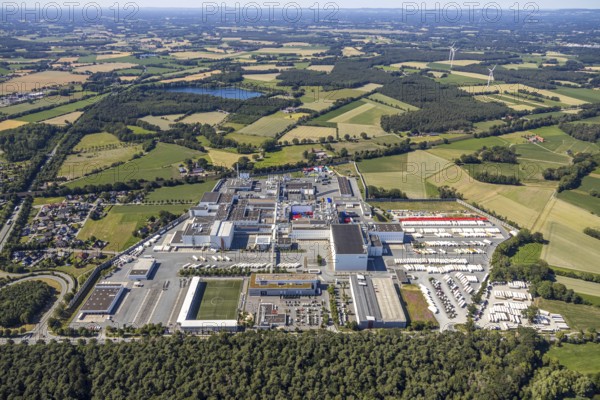 Aerial view, Corona at Tönnies, headquarters of Fleischfabrik Tönnies Lebensmittel GmbH & Co. KG, Nordrheda-Ems, Rheda-Wiedenbrück, Ostwestfalen, North Rhine-Westphalia, Germany, DE, Europe, birds-eyes view, aerial view, aerial photography, aerial photography, overview, bird's eye view, corona outbreak at Tönnies meat factory, air cooling, cutting plant, slaughterhouse, lock-down, corona pandemic, pandemic, don't call it Schnitzel, Tillmans, Tillman's, lorry trailer, refrigerated trailer, company closure