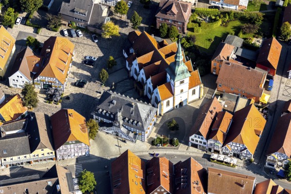 Aerial view, Rietberg town hall, catholic parish church St. Johannes Baptist, Rietberg, OWL, Ostwestfalen-Lippe, East Westphalia, North Rhine-Westphalia, Germany, Old Town, Old Town Bolzenmarkt, Old Town view, place of worship, authority, DE, Europe, half-timbered houses, religious community, place of worship, holy place, church, parish, denomination, aerial view, aerial photography, aerial photography, OWL-Buch, OWL-Buch, parish church, town hall, Rathausstraße, religion, religious site, place of interest, city administration, overview, administration, bird's-eye view, birds-eyes view, historic city centre, overview