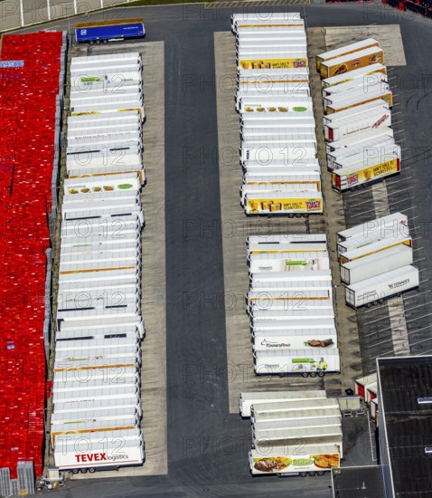 Aerial view, Corona at Tönnies, headquarters of Fleischfabrik Tönnies Lebensmittel GmbH & Co. KG, Nordrheda-Ems, Rheda-Wiedenbrück, Ostwestfalen, North Rhine-Westphalia, Germany, DE, Europe, birds-eyes view, aerial view, aerial photography, aerial photography, overview, bird's eye view, corona outbreak at Tönnies meat factory, air cooling, cutting plant, slaughterhouse, lock-down, corona pandemic, pandemic, don't call it Schnitzel, Tillmans, Tillman's, lorry trailer, refrigerated trailer, company closure