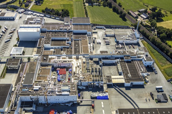 Aerial view, Corona at Tönnies, headquarters of Fleischfabrik Tönnies Lebensmittel GmbH & Co. KG, Nordrheda-Ems, Rheda-Wiedenbrück, Ostwestfalen, North Rhine-Westphalia, Germany, DE, Europe, birds-eyes view, aerial view, aerial photography, aerial photography, overview, bird's eye view, corona outbreak at Tönnies meat factory, air cooling, cutting plant, slaughterhouse, lock-down, corona pandemic, pandemic, don't call it Schnitzel, Tillmans, Tillman's, lorry trailer, refrigerated trailer, company closure