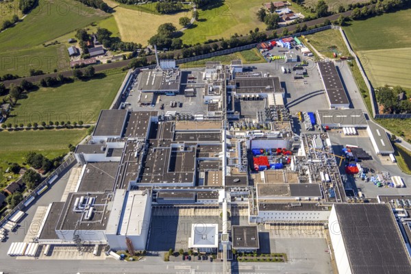 Aerial view, Corona at Tönnies, headquarters of Fleischfabrik Tönnies Lebensmittel GmbH & Co. KG, Nordrheda-Ems, Rheda-Wiedenbrück, Ostwestfalen, North Rhine-Westphalia, Germany, DE, Europe, birds-eyes view, aerial view, aerial photography, aerial photography, overview, bird's eye view, corona outbreak at Tönnies meat factory, air cooling, cutting plant, slaughterhouse, lock-down, corona pandemic, pandemic, don't call it Schnitzel, Tillmans, Tillman's, lorry trailer, refrigerated trailer, company closure