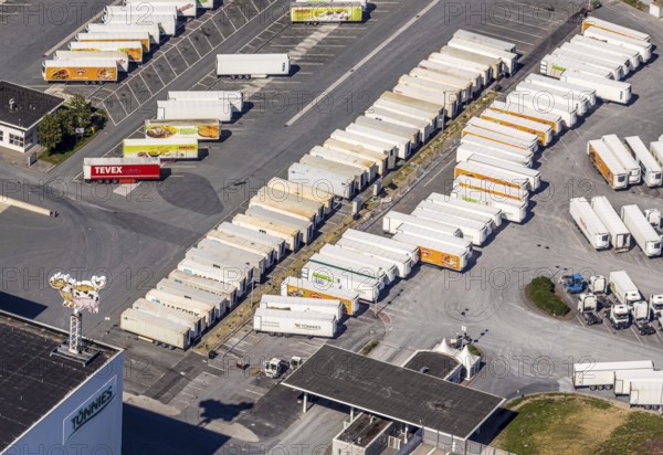 Aerial view, Corona at Tönnies, headquarters of Fleischfabrik Tönnies Lebensmittel GmbH & Co. KG, Nordrheda-Ems, Rheda-Wiedenbrück, Ostwestfalen, North Rhine-Westphalia, Germany, DE, Europe, birds-eyes view, aerial view, aerial photography, aerial photography, overview, bird's eye view, corona outbreak at Tönnies meat factory, air cooling, cutting plant, slaughterhouse, lock-down, corona pandemic, pandemic, don't call it Schnitzel, Tillmans, Tillman's, lorry trailer, refrigerated trailer, company closure