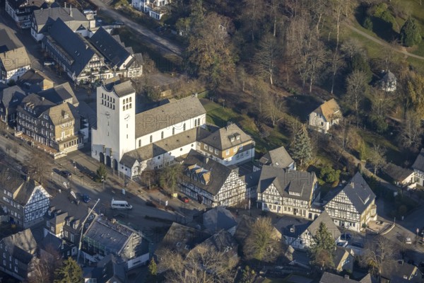 Aerial view, St George's Catholic Church, half-timbered houses, Fredeburg, Schmallenberg, Sauerland, North Rhine-Westphalia, Germany, place of worship, DE, Europe, gastronomy, religious community, place of worship, property tax, holy place, high street, real estate, church, parish, church square, denomination, aerial view, aerial photography, aerial photography, Poststube Bad Fredeburg, religion, religious site, overview, bird's-eye view, residential complex, living and life, residential area, residential buildings, birds-eyes view, overview
