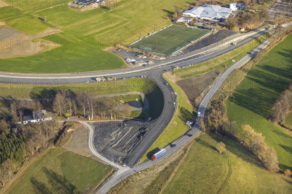 Aerial view, new construction of the bypass L776n Bad Fredeburg, SauerlandBad, sports field, federal road B511, Fredeburg, Schmallenberg, Sauerland, North Rhine-Westphalia, Germany, bathing establishment, bathing resort, construction work, building, building area, building site, building plots, construction measure, construction project, construction site, bridge, DE, relief of the through road, Europe, leisure activities, property tax, indoor swimming pool, real estate, state road L776n, aerial view, aerial photography, aerial photography, new construction, bypass, swimming pool, Stoppelhof, overview, bypass road, bird's eye view, forest area, residential area, housing and living, residential area, residential buildings, quality of life, birds-eyes view, overview