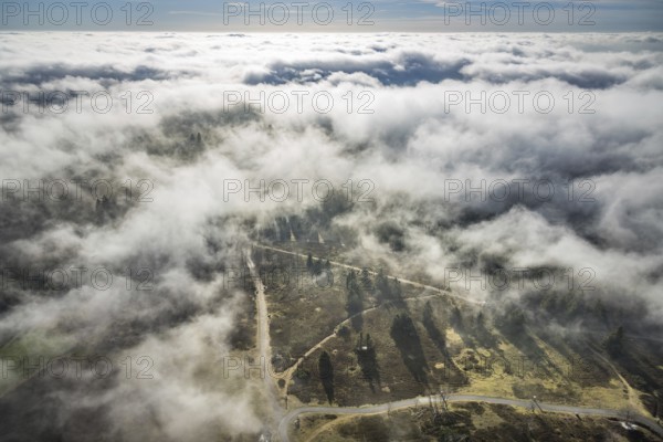 Aerial view, clouds over the Kahler Asten, highest mountain in North Rhine-Westphalia, Kahler Asten, 842 m high mountain with heathland as well as observation tower and restaurant on the summit, Winterberg, Sauerland, North Rhine-Westphalia, Germany