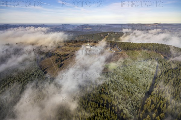 Aerial view, clouds over the Kahler Asten, Astenturm and hotel-restaurant, second highest mountain in North Rhine-Westphalia, Kahler Asten, 842 m high mountain with heathland as well as observation tower and restaurant on the summit, Winterberg, Sauerland, North Rhine-Westphalia, Germany