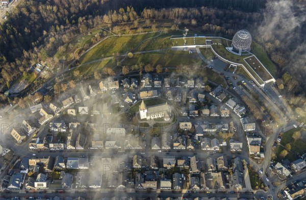 Aerial view, Winterberg centre, Catholic church looking out of the clouds, Oversum Vital Resort, Winterberg, Winterberg, Sauerland, North Rhine-Westphalia, Germany