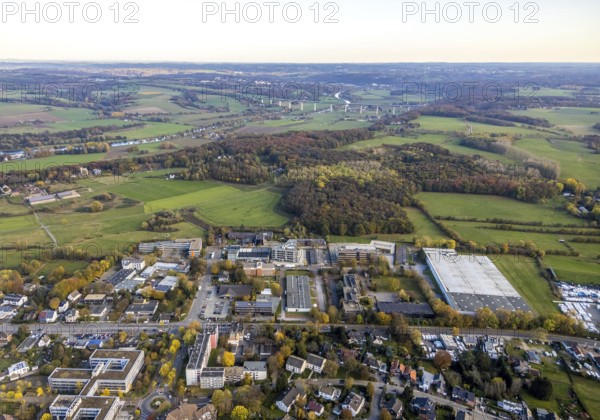 Aerial view, industrial area Solinger Straße, Kölner Straße, view to Mintarder Ruhrtalbrücke, Saarn, Mülheim an der Ruhr, Ruhr area, North Rhine-Westphalia, Germany, motorway A52, motorway bridge, bridge, DE, Europe, distant view, river Ruhr, aerial view, aerial photography, aerial photography, Ruhrbrücke, overview, bird's-eye view, forest, birds-eyes view, overview