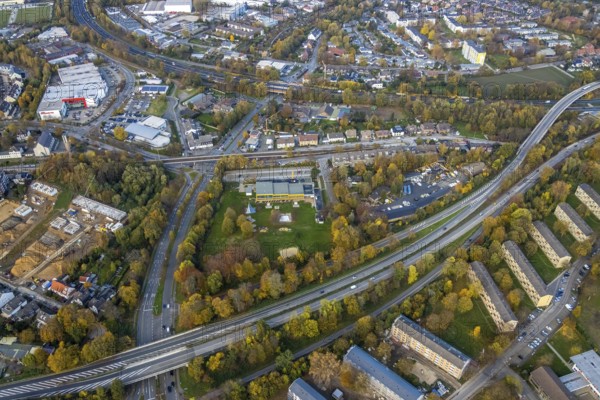 Aerial view, Friedrich-Wennmann-Bad, construction site of former football pitch, new single-family houses, St. Joseph Kirche, Heißen - Mitte, Mülheim an der Ruhr, Ruhr area, North Rhine-Westphalia, Germany, place of worship, bathing establishment, bathing resort, construction work, construction area, building site, building plots, construction project, construction site, DE, Europe, outdoor pool, leisure, religious community, house of worship, indoor swimming pool, holy place, church, parish, denomination, aerial view, aerial photography, aerial photography, new building, religion, religious site, swimming pool, overview, bird's-eye view, birds-eyes view, overview