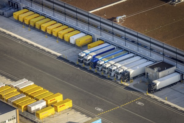Aerial view, construction site of new Amazon logistics centre, industrial estate on Brauckstraße, trucks and containers, Rüdinghausen, Witten, Ruhr area, North Rhine-Westphalia, Germany