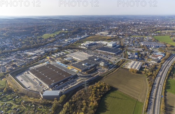 Aerial view, construction site of new Amazon logistics centre, industrial estate on Brauckstrasse, Bauhaus, Faiveley Transport Witten, Ostermann furniture store, Rüdinghausen, Witten, Ruhr area, North Rhine-Westphalia, Germany