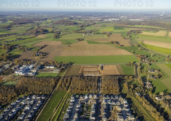 Aerial photo, construction site for sports field at school centre, Tersteegenstraße, school centre, municipal comprehensive school, Theodor-Heuss-Schule, Haarbeckschule, leisure pool, sports field, Neukirchen-Vluyn, Lower Rhine, North Rhine-Westphalia, Germany, construction work, building, construction area, building site, building plots, construction measure, construction project, construction site, education, educational institution, DE, Europe, distant view, football pitch, football stadium, educational institute, aerial view, aerial photography, aerial photography, new building, photovoltaic, photovoltaic plant, Ruhr area, school, solar, solar plant, solar energy, solar energy, sports, sports facilities, sports facility, overview, bird's-eye view, meadows and fields, birds-eyes view, overview
