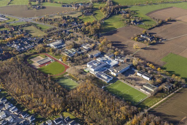 Aerial view, school centre, municipal comprehensive school, Theodor-Heuss-Schule, Haarbeckschule, leisure pool, sports field, Tersteegenstraße, Neukirchen-Vluyn, Lower Rhine, North Rhine-Westphalia, Germany, education, educational institution, DE, Europe, football pitch, football stadium, educational institute, aerial view, aerial photography, aerial photography, photovoltaics, photovoltaic system, Ruhr area, school, solar, solar system, solar energy, solar energy, sport, sports facilities, sports facility, overview, bird's eye view, bird's eye view, overview