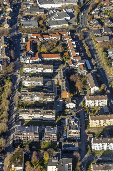 Aerial view, view of Neukirchen, Hochstraße, Andreas-Bräm-Straße, residential buildings, Neukirchen, Neukirchen-Vluyn, Ruhr area, North Rhine-Westphalia, Germany, construction work, construction, construction area, building site, building plots, construction project, construction site, burial site, DE, Europe, cemetery, memorial site, God's acre, property tax, graves, cemetery, real estate, aerial view, aerial photography, aerial photography, new construction, town view, terraced houses, resting place, townscape, overview, bird's-eye view, residential complex, housing and living, residential area, residential quality, residential neighbourhood, housing estate, birds-eyes view, overview